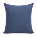 Blue textured pillow on a white background