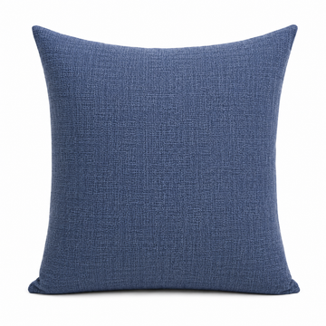 Blue textured pillow on a white background