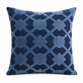 Blue patterned pillow on a white background