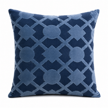 Blue patterned pillow on a white background