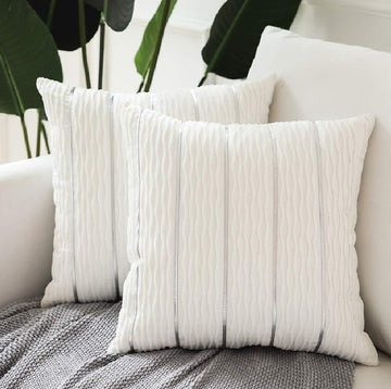 Luxury velvet striped pillow cover on sofa